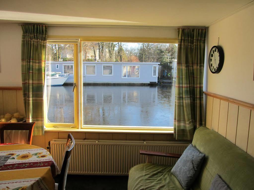 Hotel Houseboat Under The Mill Amsterdam Exterior foto